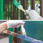 Application au pinceau de peinture verte et bleu-gris sur du métal rouillé